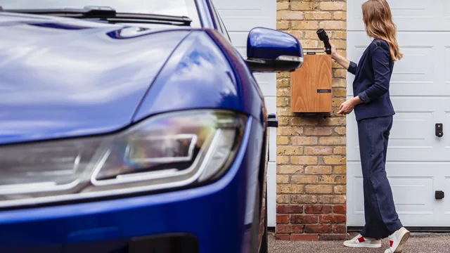 Level 2 EV charger on a garage wall in Winston-Salem, NC